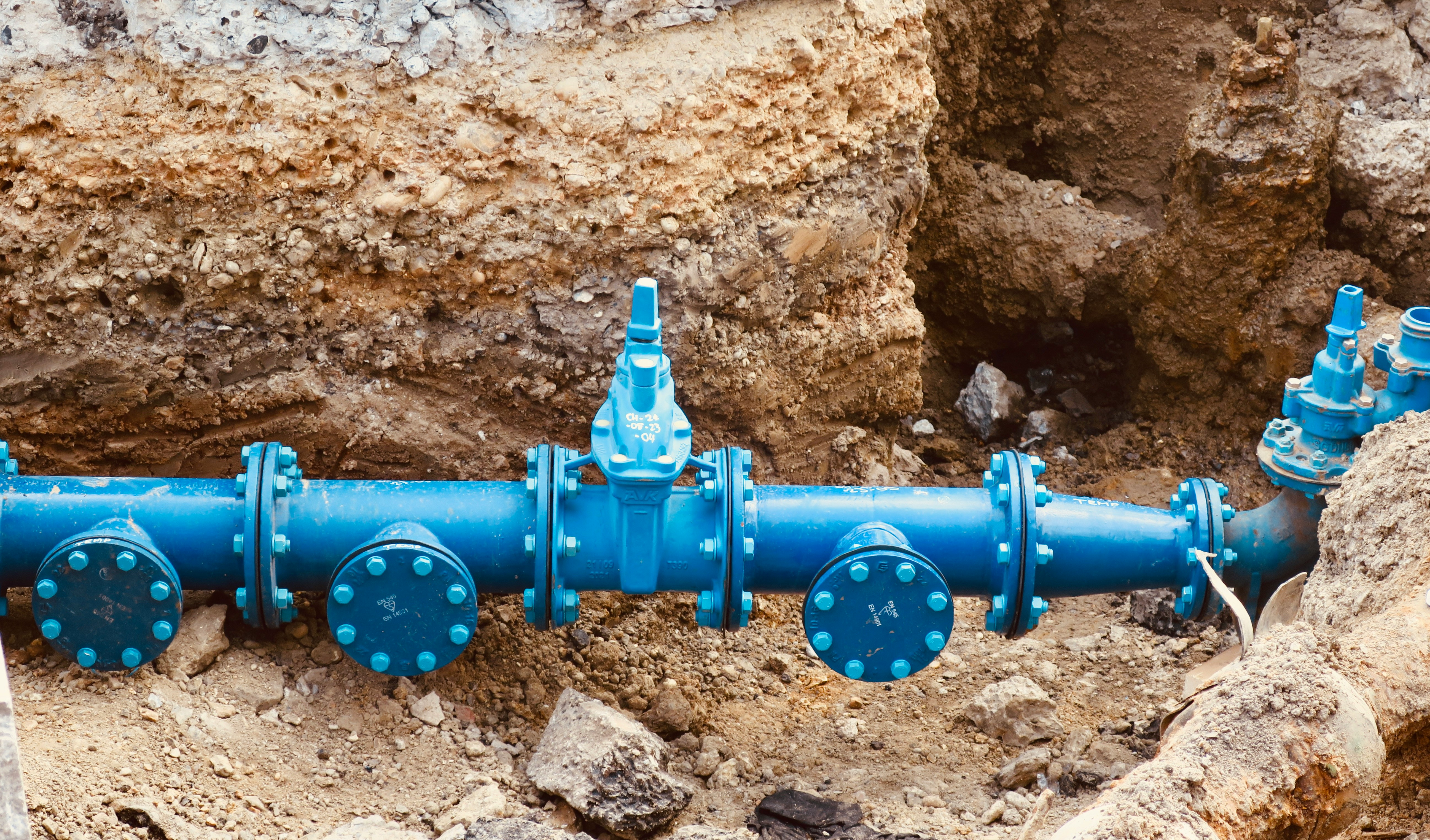 Water main in an open trench during installation